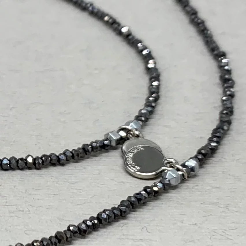 Graphite string with coins – NATA BELZ